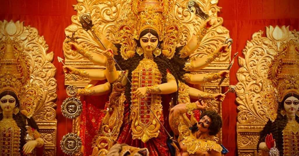 The Legend of Goddess Durga Magnificent statue of Goddess Durga adorned in gold during a religious festival in Kolkata, India.